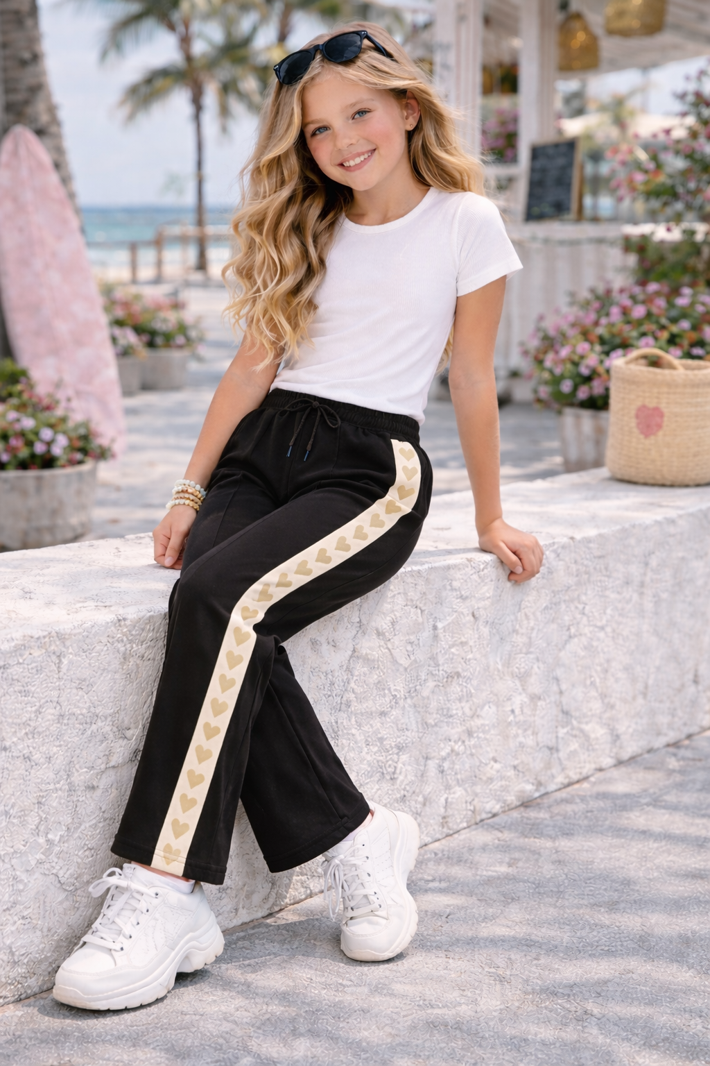 Zwarte broek met gouden hartjes voor meisjes